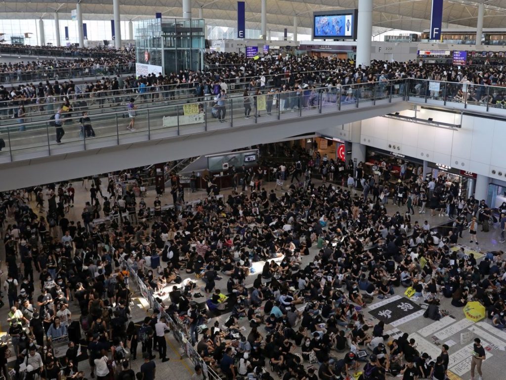 Hong Kong cancels all flights as protesters storm airport