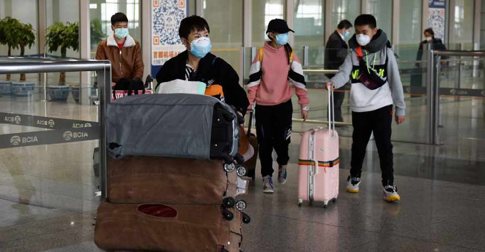 China tightens airport checks as imported coronavirus cases tick up